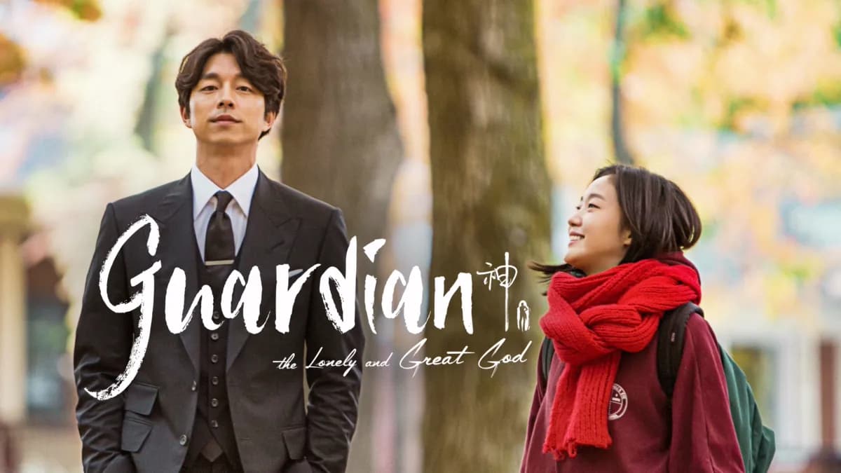 Goblin dizisinde Lee Shin ve ona kırmızı atkısıyla gülerek bakan Ji Eun-Tak